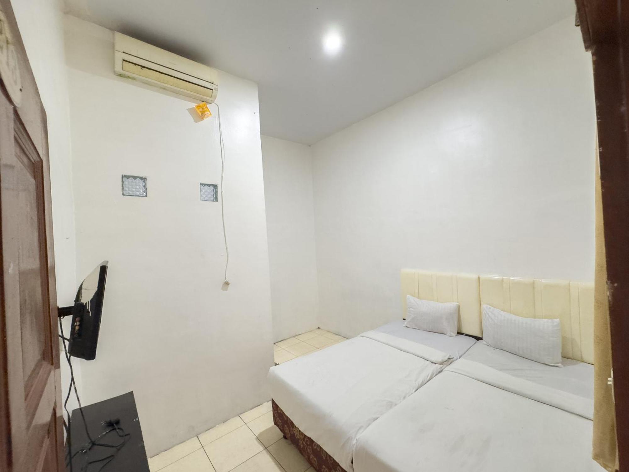 Pondok Wisata Istana XI Медан Екстериор снимка